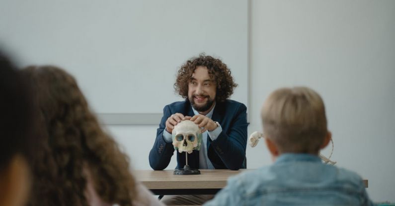 Classroom - Teacher Showing His Class a Human Skull