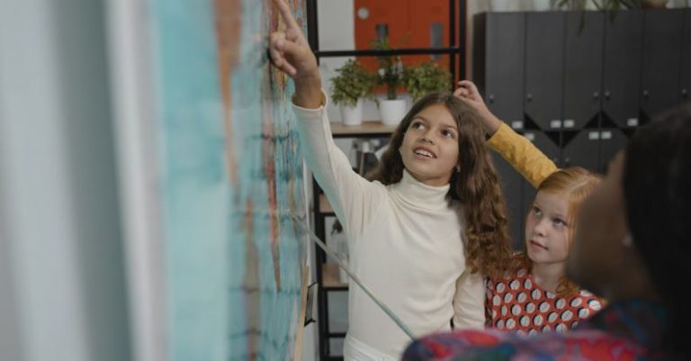 Learning - Attentive Student pointing on a Map