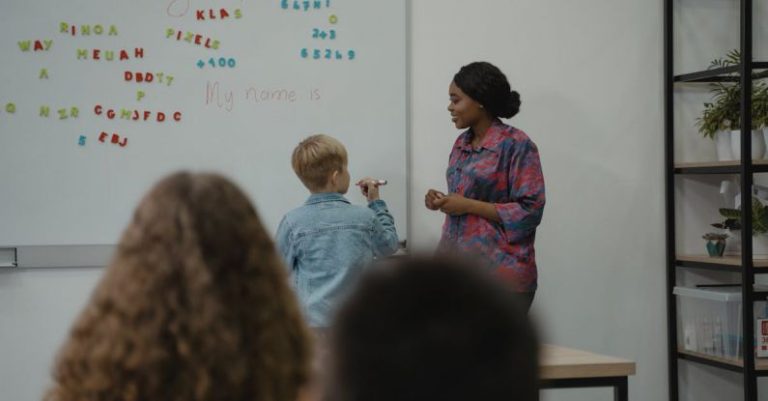 Learning - A Student Standing in front of a Class