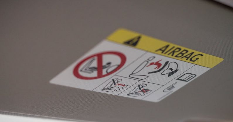 Instruction - White and Yellow Card on Gray Surface